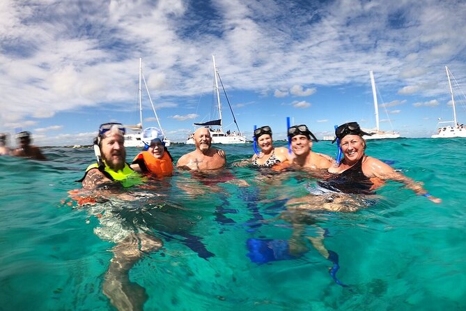 Luxury Catamaran Privilege to Isla Mujeres + Open Bar VIP - The Ride Back: Music, Dancing, and Drinks