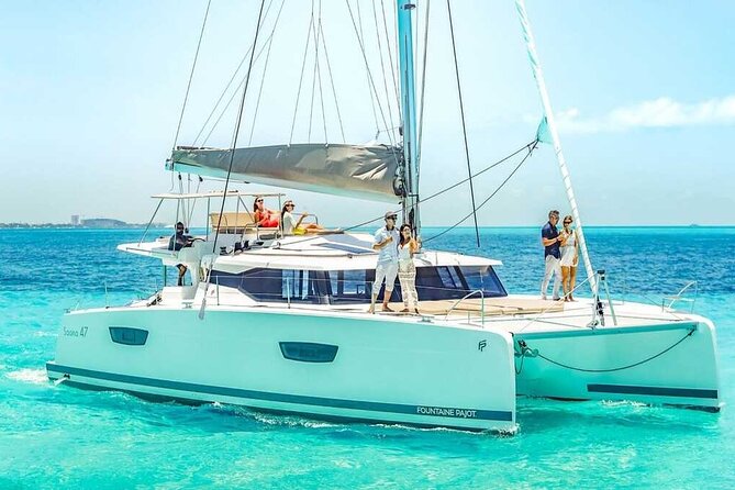 Luxury Catamaran Privilege to Isla Mujeres + Open Bar VIP - Cruising Over the Caribbean on a Shared Catamaran