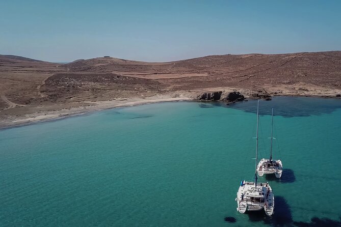 Luxury Catamaran Semi private cruise with meals & drinks and transportation. - Seeing Delos without leaving the catamaran