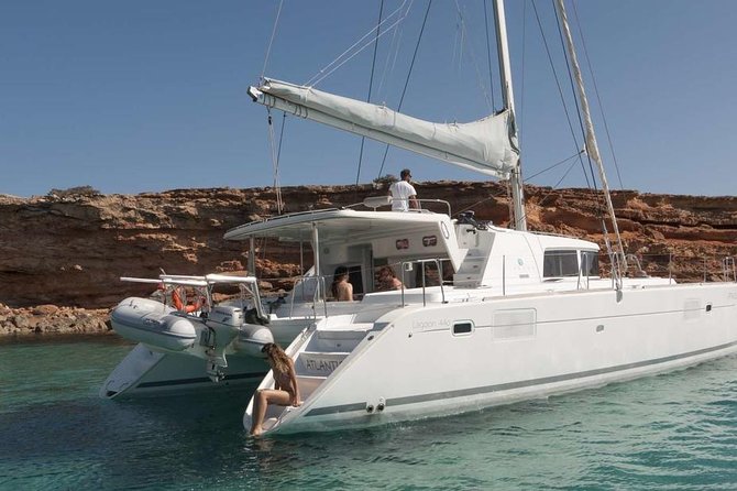 Luxury Catamaran Semi private cruise with meals & drinks and transportation. - Passing Baos, the old pirates’ island