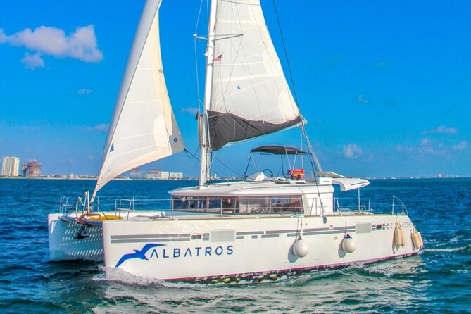 Luxury Catamaran Tour to Isla Mujeres with Transportation - From Marina Albatros to Open Water