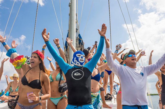 Luxury Catamaran tour to Isla Mujeres with transportation from Playa del Carmen - Boarding at Puerto Juarez and settling onto the 45-foot catamaran