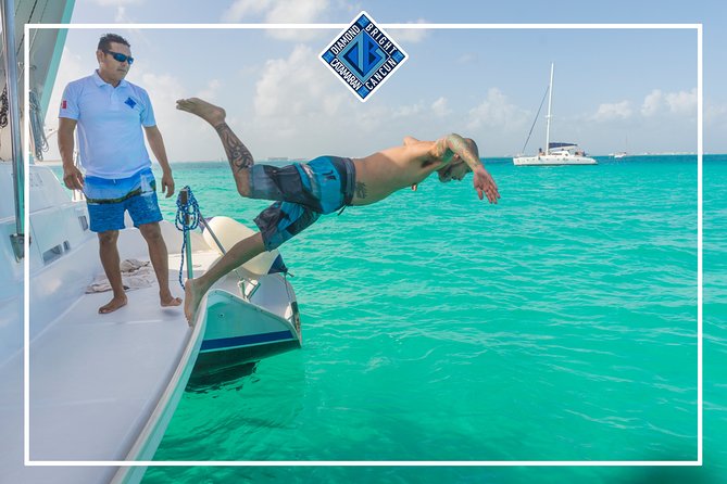 Luxury Catamaran tour to isla mujeres with transportation from Tulum - Snorkeling in a crowded reef area