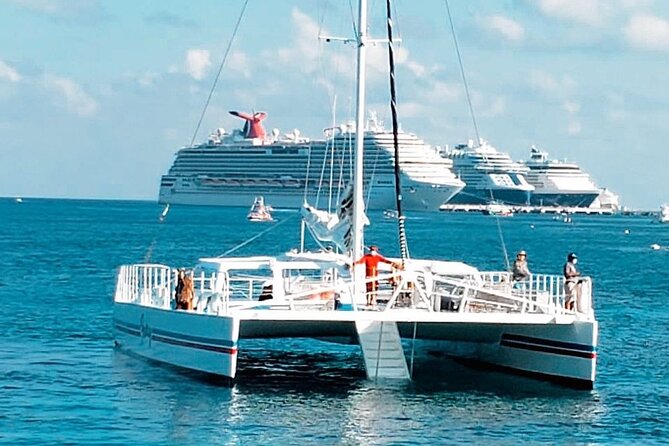 Luxury Cozumel Catamaran: Snorkel, Beach Club & Relaxation - Burgers, fries, and unlimited drinks