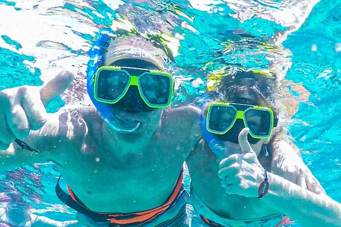 Luxury Cozumel Catamaran: Snorkel, Beach Club & Relaxation - Boarding the 65-foot catamaran at 1:00 p.m.