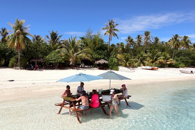 LUXURY PRIVATE Catamaran : Full-Day Sail & Polynesian Motu Lunch - Swimming in a quiet bay near the reef