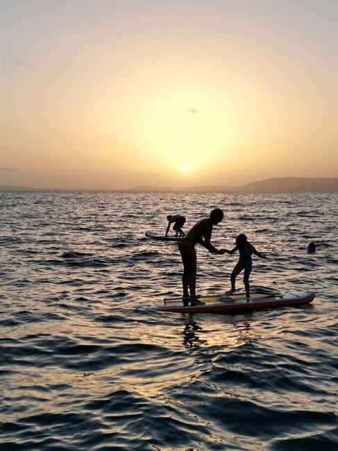 Majorca: Dinner aboard a private catamaran with snorkeling and paddle surfing - The first 45 minutes across Palma Bay
