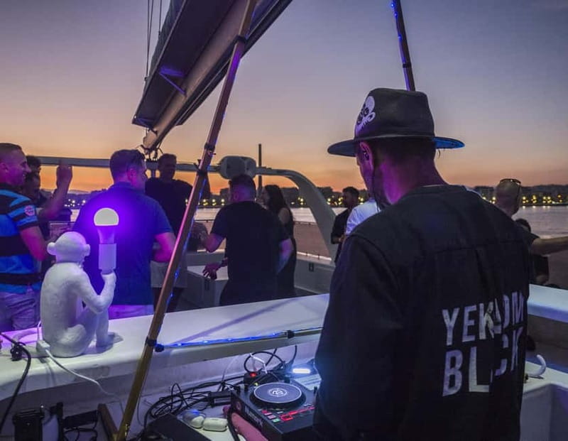 Malaga: Catamaran Sunset or Night Cruise w/ Live DJ & Drink - Boarding at Malaga Port near Mundo Marino