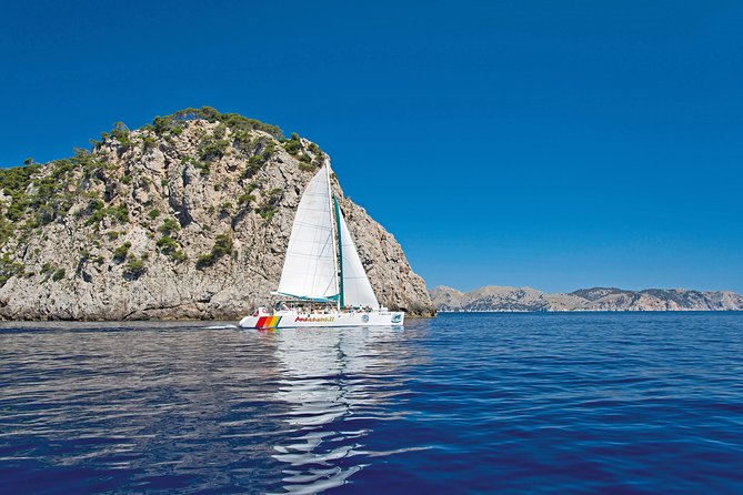 Mallorca Catamaran Cruise with Scenic Views and BBQ Lunch - Coll Baix, a hard-to-reach first stop