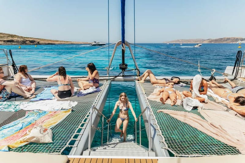 Malta: Blue Lagoon, Beaches & Bays Trip by Catamaran - What the boat is like between stops