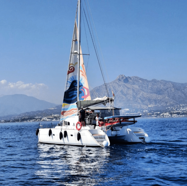 Marbella: Group Dolphin Watching Catamaran Tour with Snacks - Key points at a glance