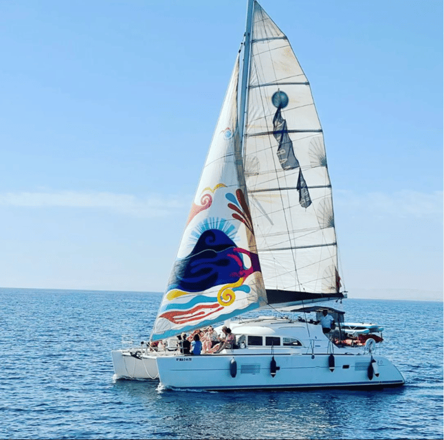 Marbella: Group Dolphin Watching Catamaran Tour with Snacks - A catamaran built for relaxing, not just moving