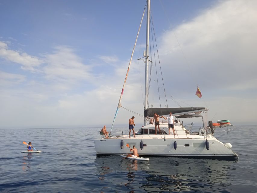Marbella: Group Dolphin Watching Catamaran Tour with Snacks - The crew can shape the whole mood