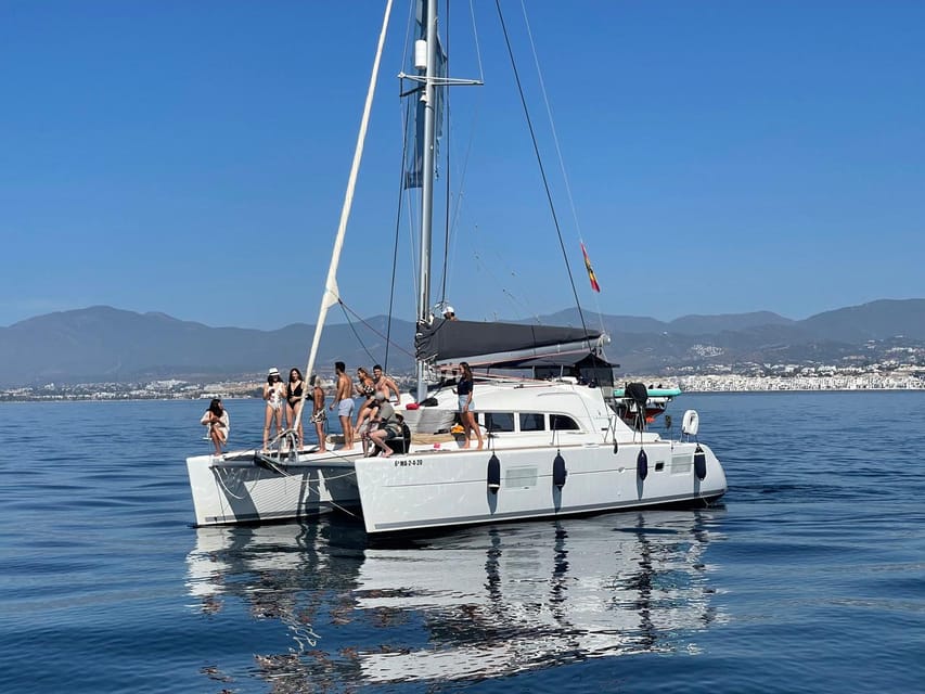 Marbella: Group Dolphin Watching Catamaran Tour with Snacks - Finding Daria at Puerto José Banús