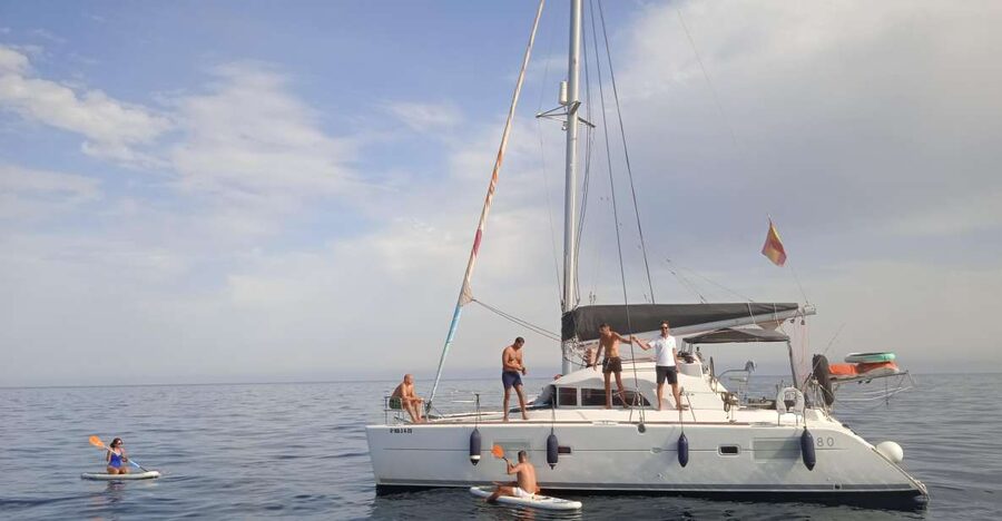 Marbella: Private Cruise in Catamaran - Swimming, Paddleboards, Kayaks, and Fishing