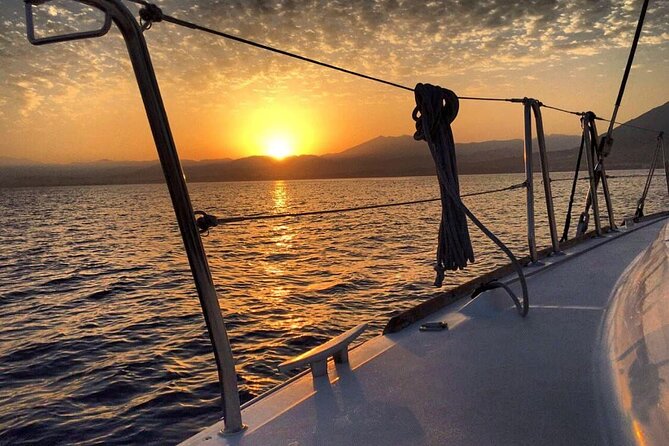 Marbella Small Group Catamaran with Dolphin Watching - Sunset, drinks, and the ride back