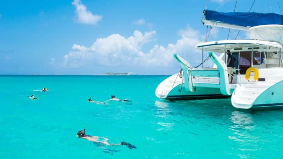 Mauritius: Ile aux Cerf Catamaran w/Waterfall Visit & Lunch - Snorkeling in the clear lagoon water