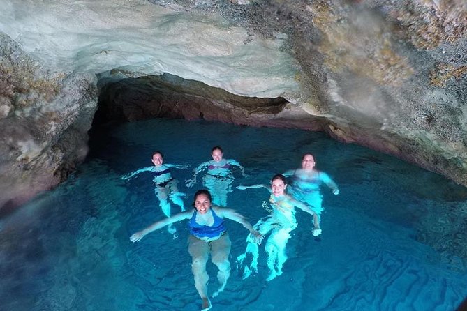 Milos caves snorkelling Catamaran Cruise in a small group - A full day on a shaded catamaran