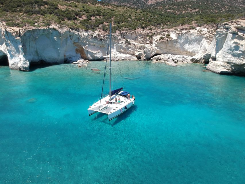 Milos: Full-Day Catamaran Cruise with Paddle Board - Wind changes the plan