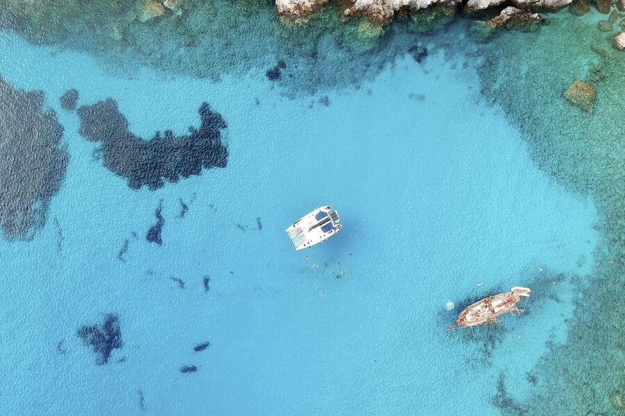 Milos: Full-Day Catamaran Cruise with Paddle Board - A last swim at Agios Dimitrios