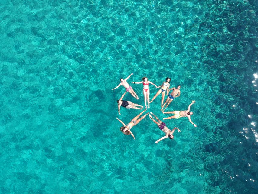 Milos: Full-Day Catamaran Cruise with Paddle Board - Food, drinks, and the value of $235