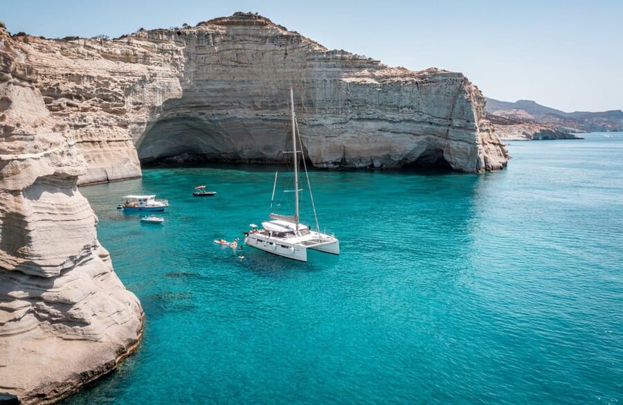 Milos: Full Day Luxury Catamaran with Full Meal & Open Bar - Triades Beach: Your First Swim and Paddle