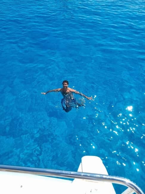 Milos: Half-day Kleftiko, Catamaran Trip | Lunch & OpenBar - Leaving Adamas for Milos’ western coast