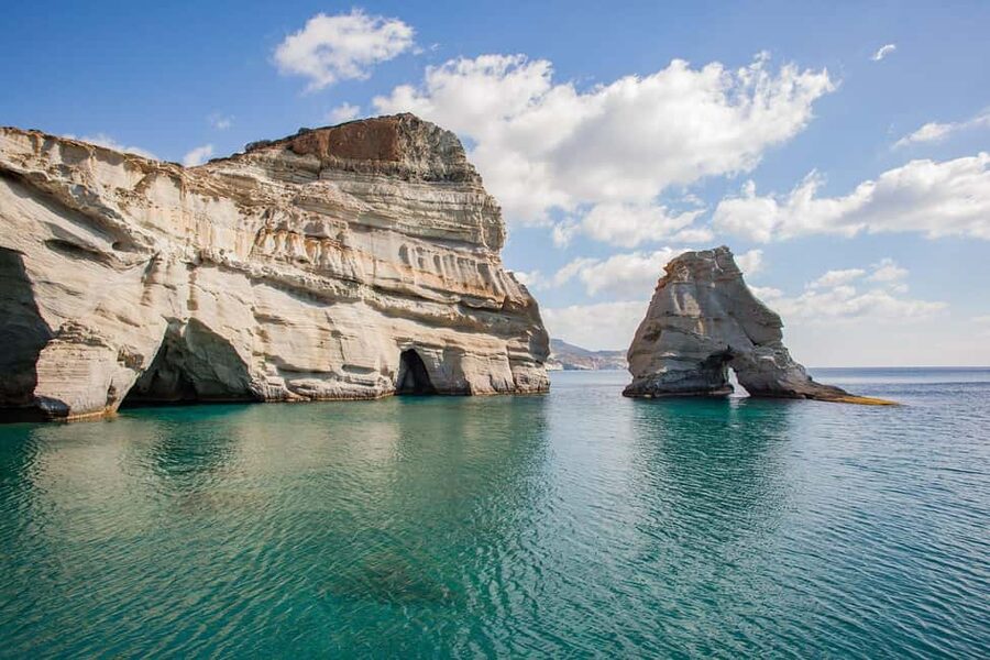 Milos: Kleftiko Half Day Catamaran Cruise with Lunch - Leaving Adamas and passing Milos’s old villages