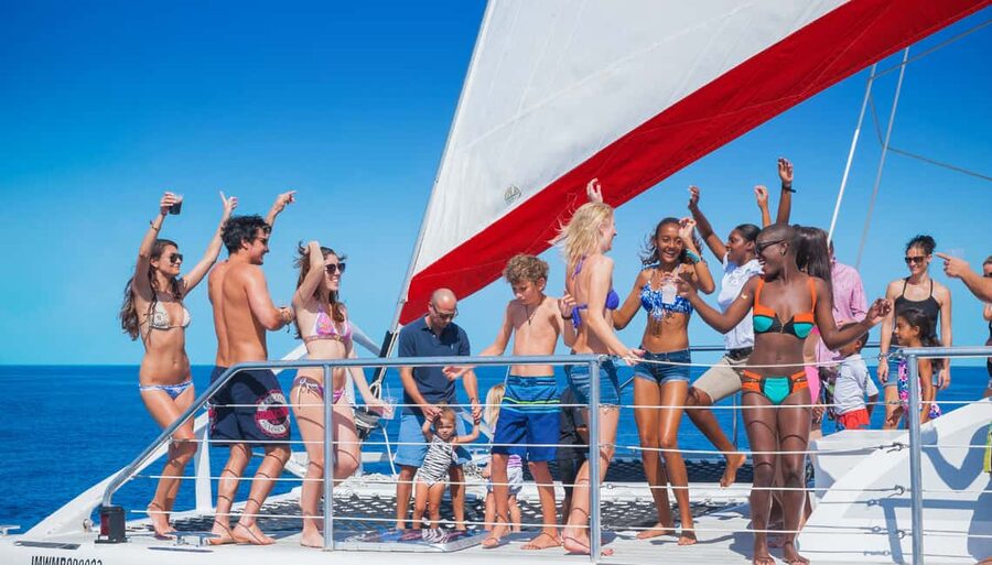 Montego Bay: Reggae Family Catamaran Cruise with Snorkeling - Snacks, fruit, and drinks on the catamaran