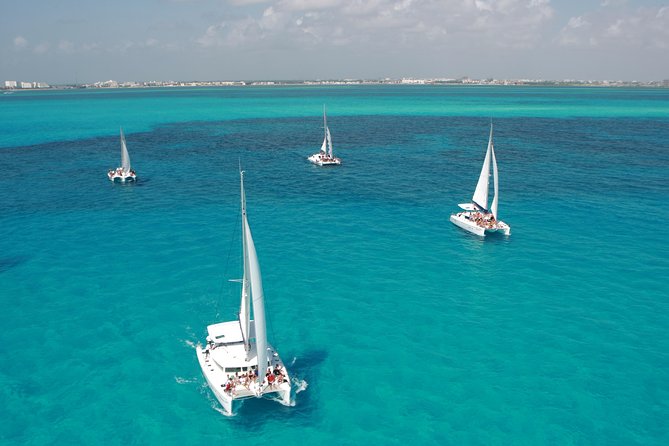 Mujeres Island Tour by Catamaran from Cancun City - Playa Tortugas and the Short Snorkeling Stop