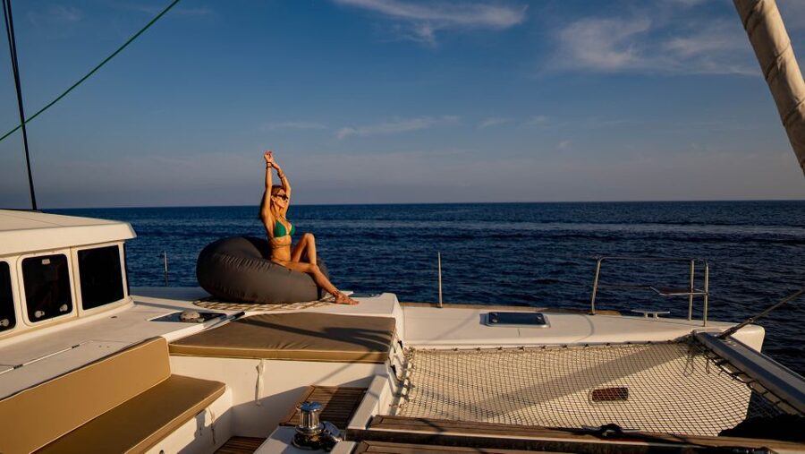 Mykonos: Boho Experience Catamaran Cruise - Swimming in Rhenia’s clear water