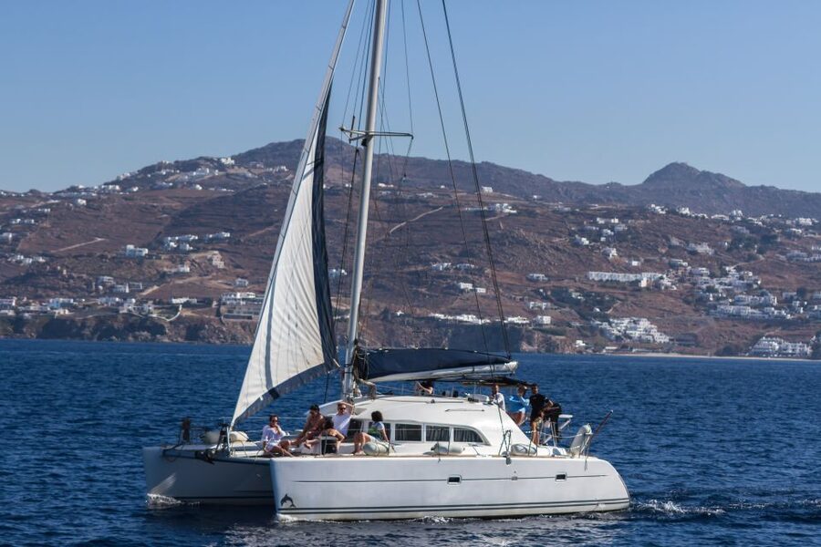 Mykonos: Catamaran Cruise With Meal and Drinks - Leaving Mykonos by minivan and catamaran