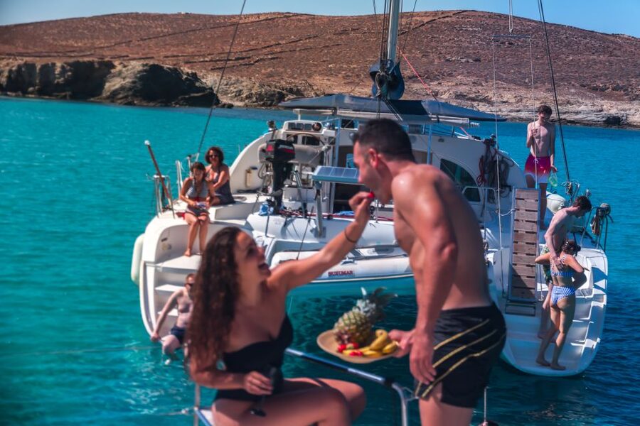 Mykonos: Catamaran Cruise With Meal and Drinks - Lunch, wine, and the onboard atmosphere