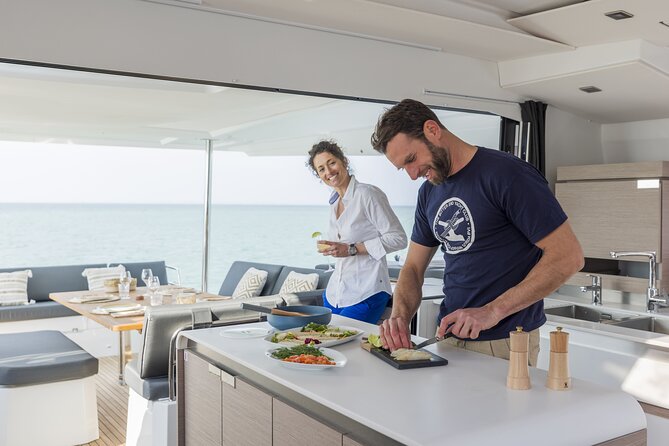 Mykonos: Luxury Catamaran Cruise with Meal, Drinks & Transport - Passing Delos without going ashore