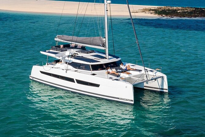 Mykonos: Luxury Catamaran Cruise with Meal, Drinks & Transport - Rhenia: the quiet-water highlight