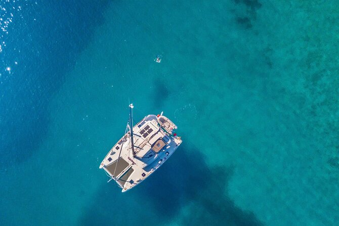 Mykonos: Private Catamaran Cruise—Hotel Pickup, BBQ & Drinks - Delos: Ancient Greece in a One-Hour Visit