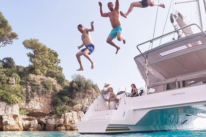 Mykonos Shared Catamaran Tour Experience - Sailing past Delos and its ancient ruins