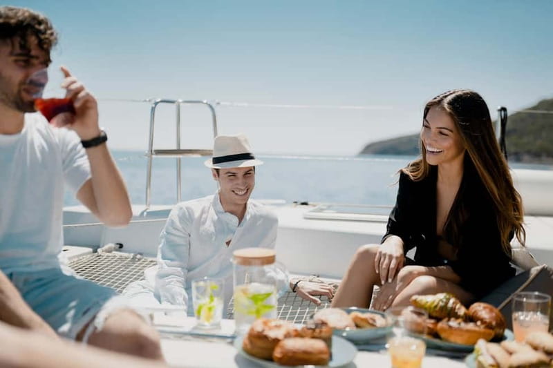 Nafplio: Catamaran Cruise with Meal and Drinks - The Romvi roundabout and sunset return