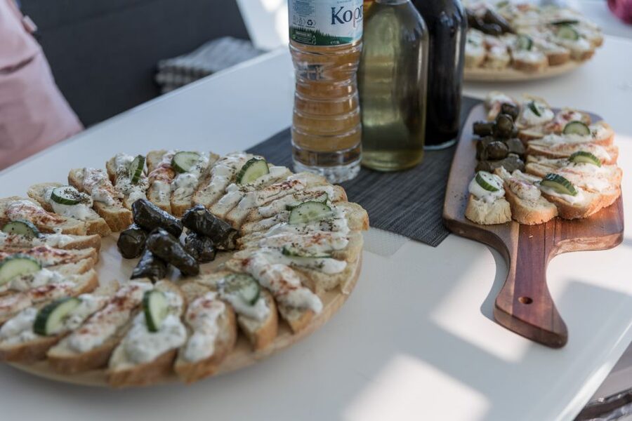 Naxos: Catamaran Cruise with Swim Stops, Food, and Drinks - What the crew adds to the day
