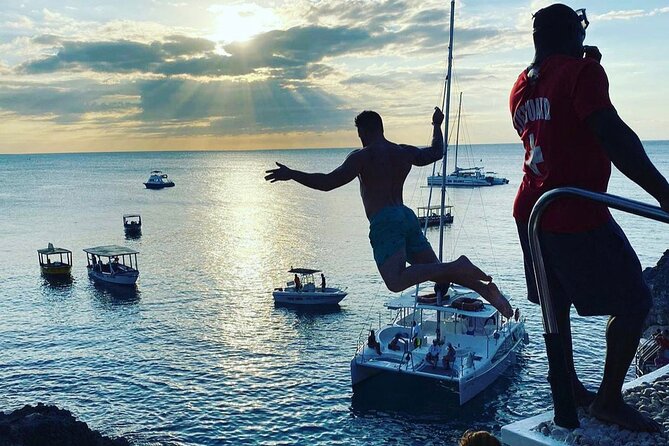 Negril 7 mile Beach, Party Catamaran Cruise , Snorkeling and Ricks Cafe Combo - Rick’s Cafe and the sunset finish