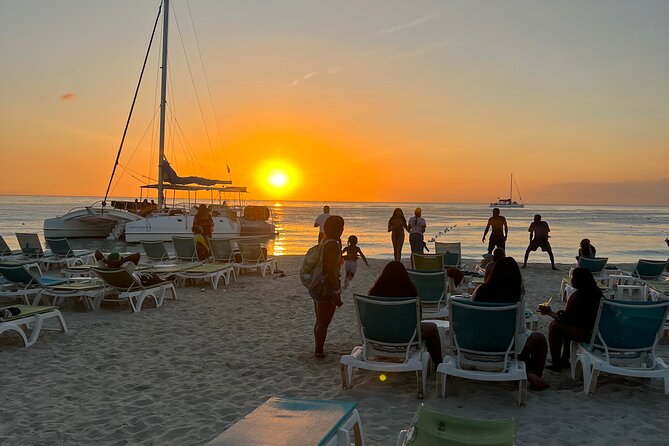 Negril Private Day Tour: ATV Ride, Party Catamaran & Ricks Cafe - The three-hour catamaran: snorkeling, music, and drinks