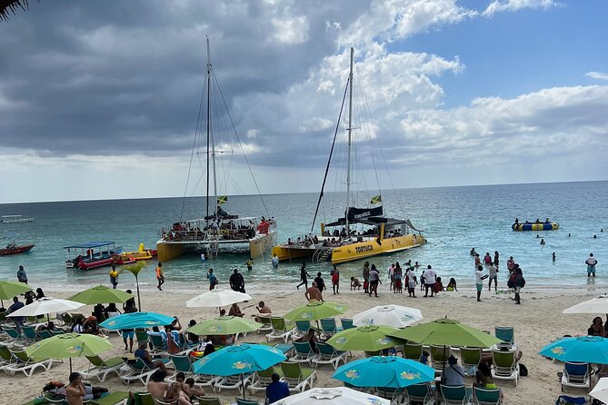 Negril Private Day Tour: ATV Ride, Party Catamaran & Ricks Cafe - Seven Mile Beach: a short stop with a useful purpose