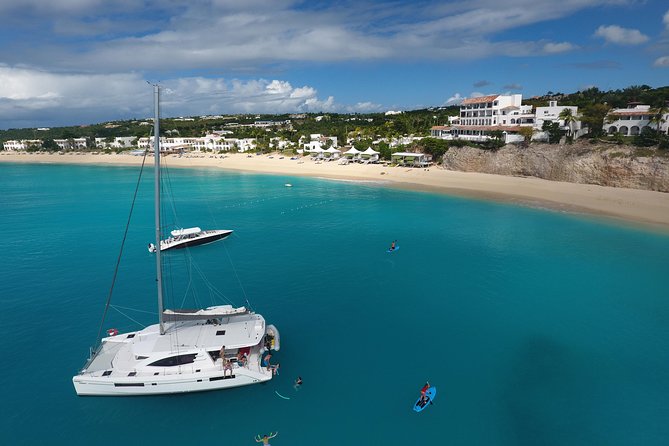 Nude Naturist Catamaran Boat Luxury Charter in St Maarten - Long Bay Samana Beach: A First Swim Stop