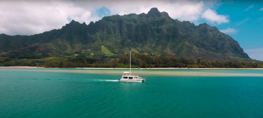 Oahu: Molii Fishpond and Kaneohe Bay Catamaran Tour - Boarding the catamaran at Secret Island