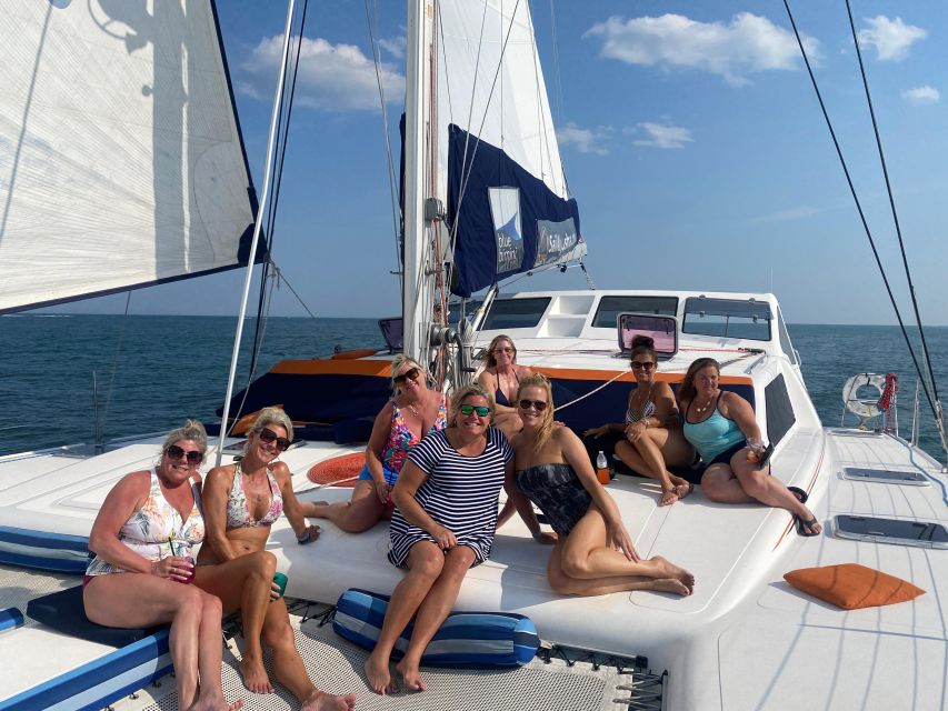 Ocean City: Sailing Catamaran Cruise with Crew - Dolphin watching from the front trampoline