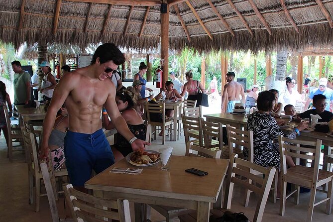 Only Adults Catamaran, Party Isla Mujeres! Departures from Cancun - The catamaran ride: music, drinks, and Caribbean views