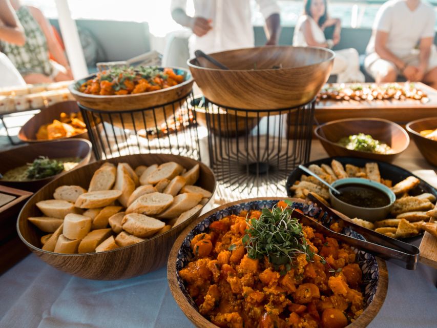 Palma de Mallorca: Half-Day Catamaran Tour with Buffet Meal - Music, drinks, and the mood onboard