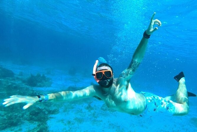 Party Catamaran Cruise with Open Bar and Snorkeling Montego Bay - Open bar, snacks, and the real value of the $180 price