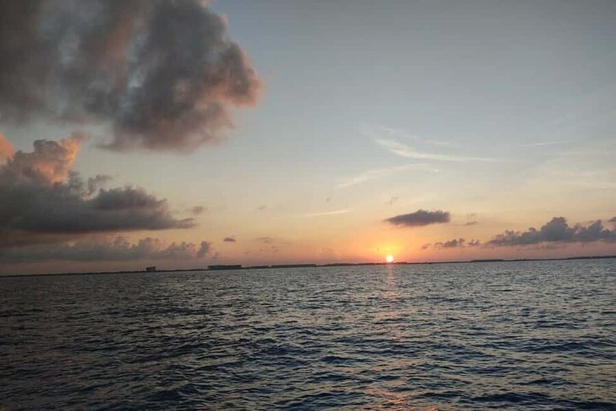 PDC: Isla Mujeres Catamaran Tour with Snorkeling - Sailing toward Isla Mujeres