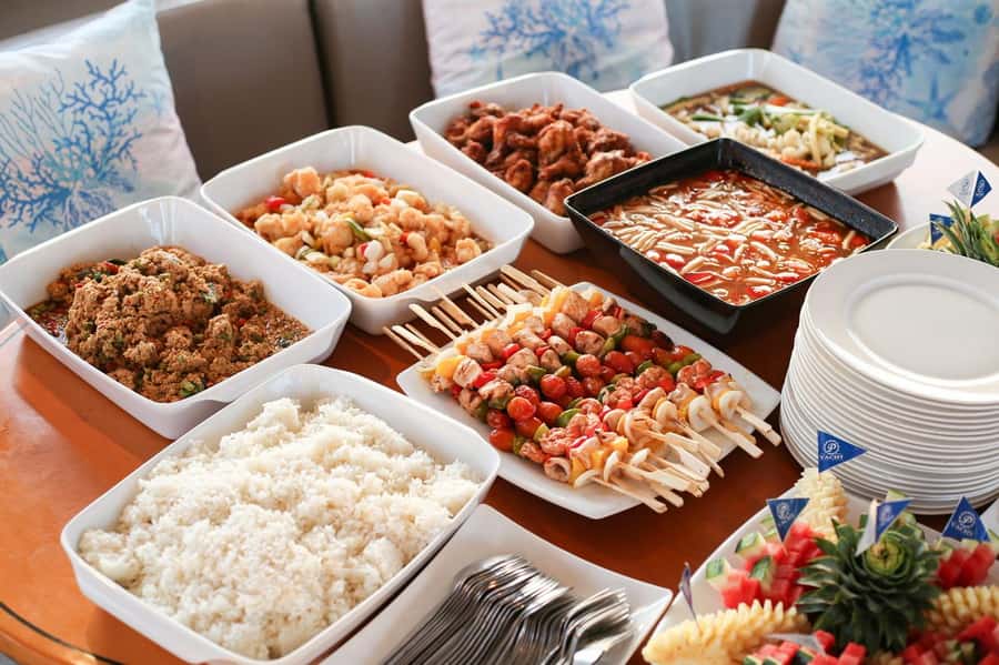 Phuket: Coral Island Day Trip and Sunset Dinner by Catamaran - From your Phuket hotel to Chalong Pier